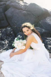 Makapu'u Beach bride by lava rocks