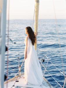 Hawaii sunrise sailboat wedding bride