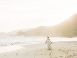 Oahu bride on the Sandys Beach at sunset